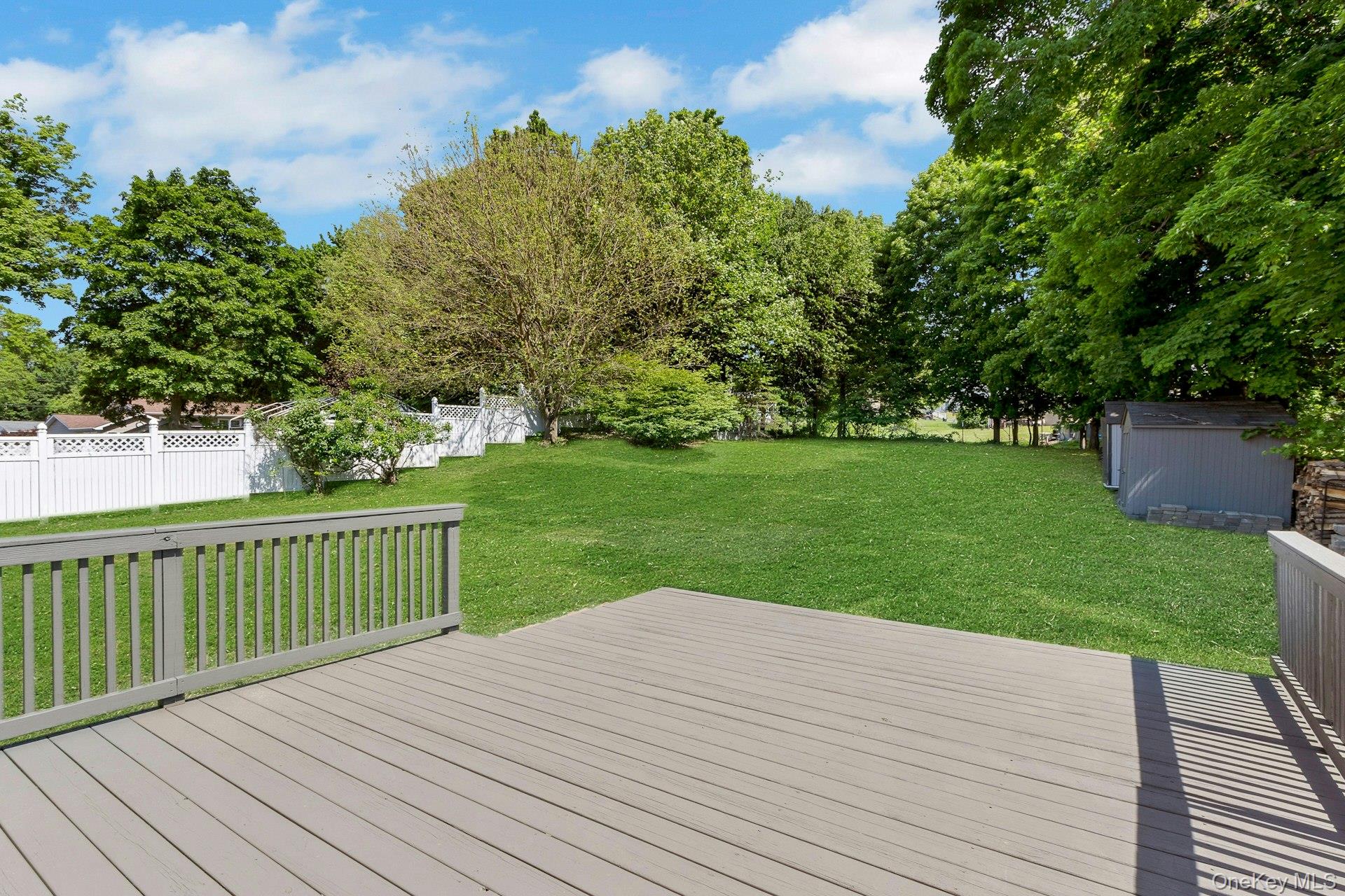 3 Ritter Drive Poughkeepsie, NY 12601 - Photo 41 of 49 Deck and large level yard with sheds
