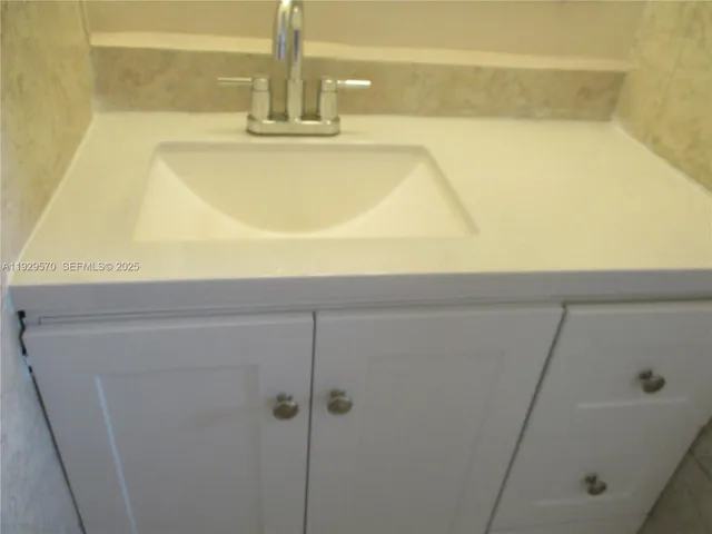 a house view with a backyard space