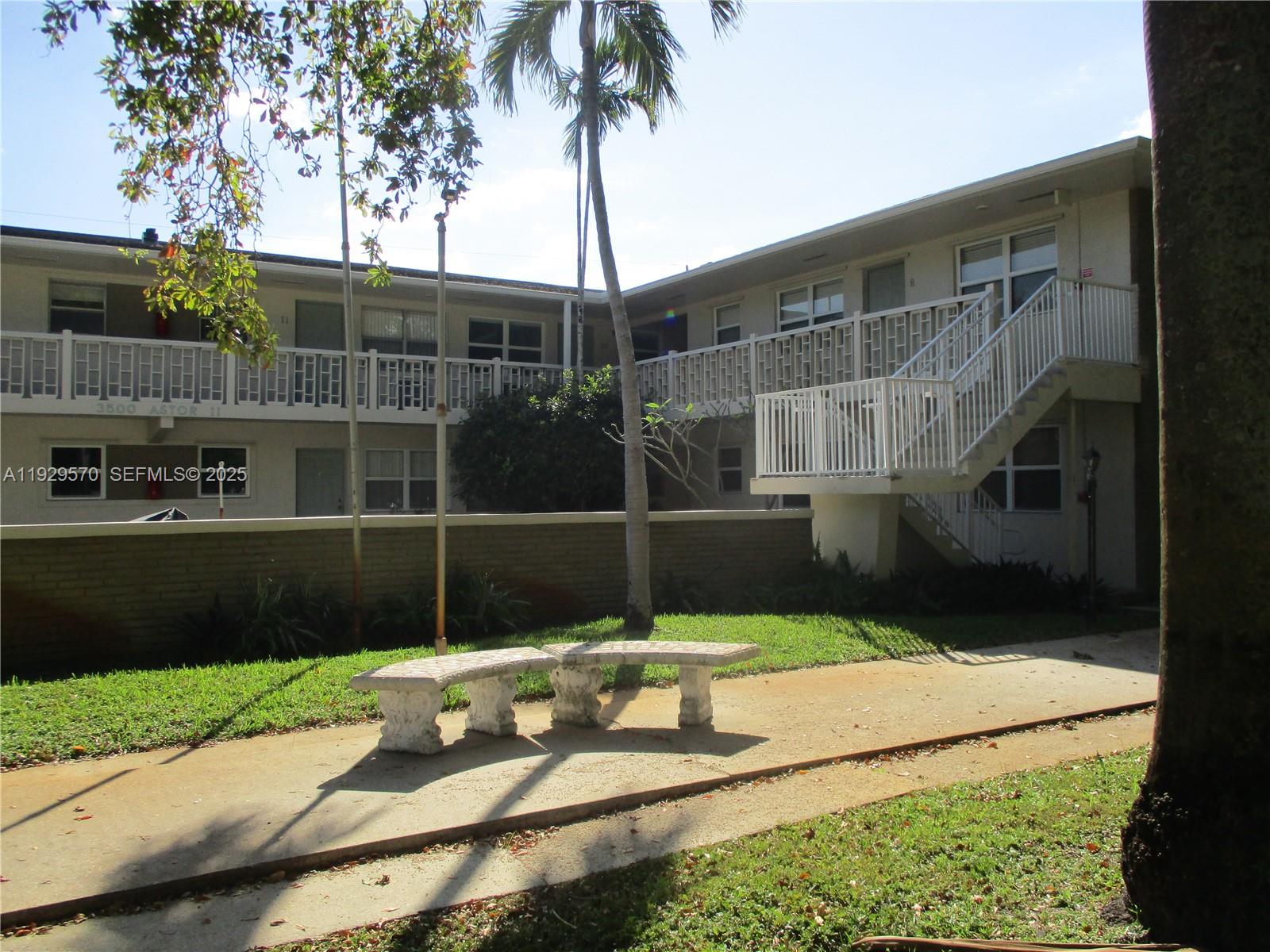 3500 Harrison Street, Unit 11 Hollywood, FL 33021 - Photo 16 of 16 a house view with a backyard space