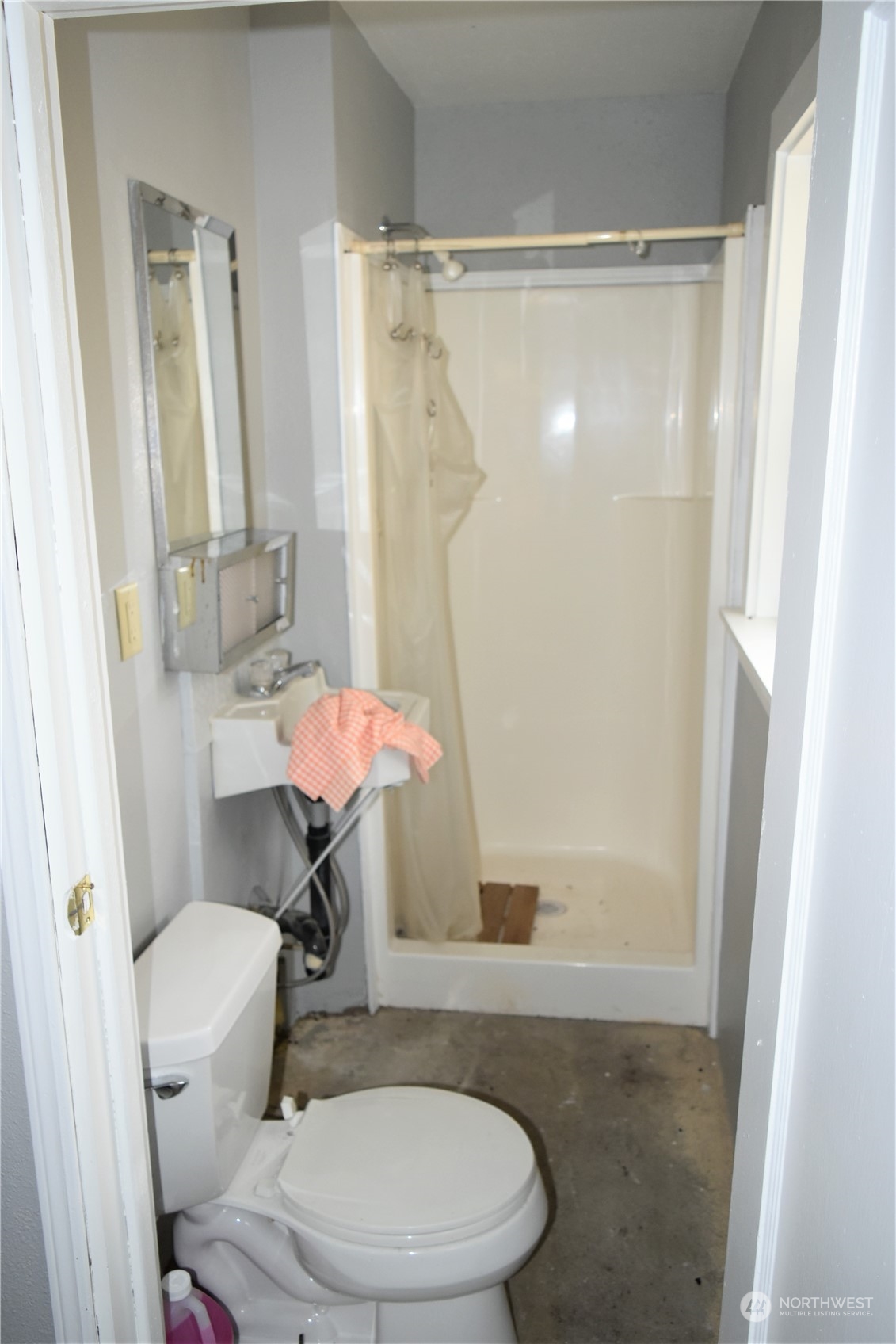 29 Klondike Road Republic, WA 99166 - Photo 23 of 24 a white toilet sitting next to a bath tub