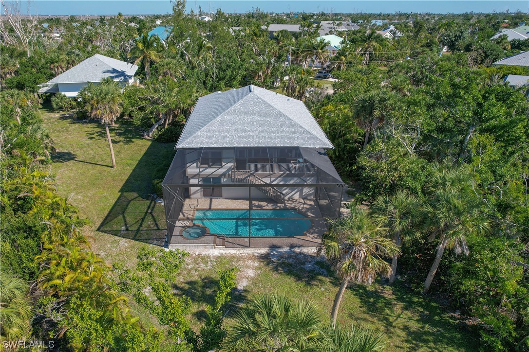2130 Sunset Circle Sanibel, FL 33957 - Photo 2 of 36 an aerial view of a house