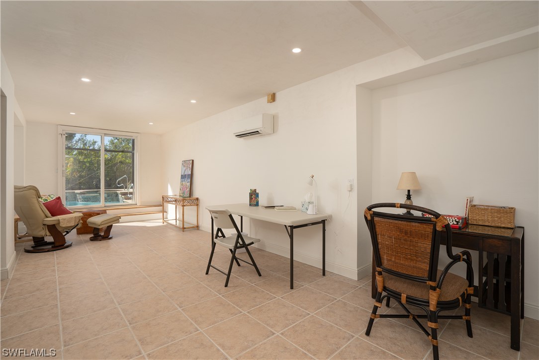 2130 Sunset Circle Sanibel, FL 33957 - Photo 31 of 36 a work room with furniture and a window