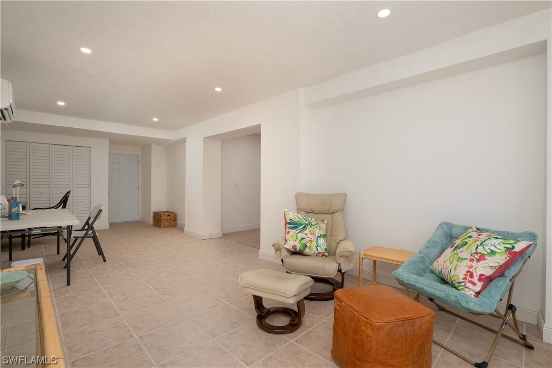 2130 Sunset Circle Sanibel, FL 33957 - Photo 32 of 36 a living room with furniture and a couch