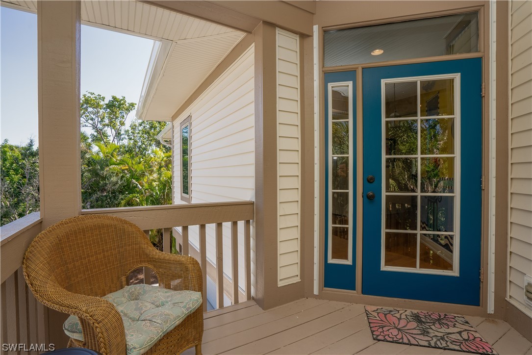 2130 Sunset Circle Sanibel, FL 33957 - Photo 4 of 36 a balcony view with a rug
