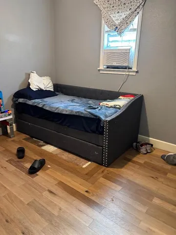 a room with table closet and window