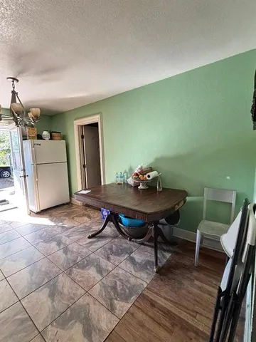 a view of a workspace with furniture