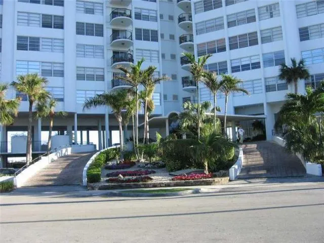 a front view of a multi story residential apartment building