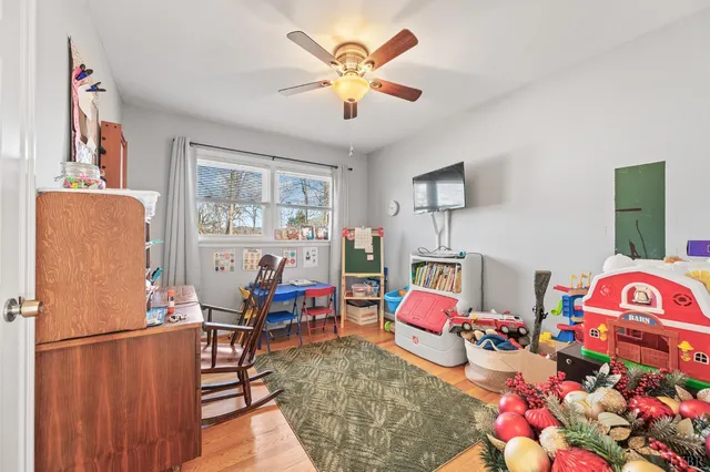 a bedroom with furniture and a bed