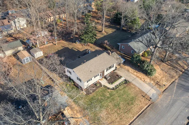 an aerial view of residential house with outdoor space