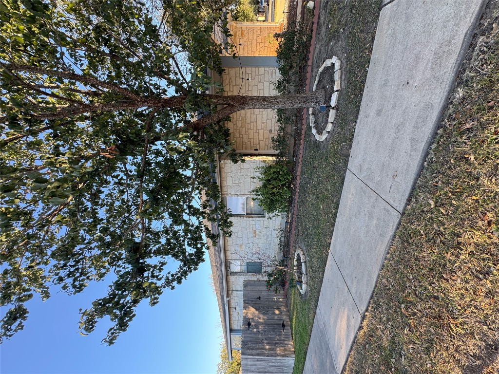 15200 Mandarin Crossing Pflugerville, TX 78660 - Photo 2 of 17 a front view of a house with yard and garage