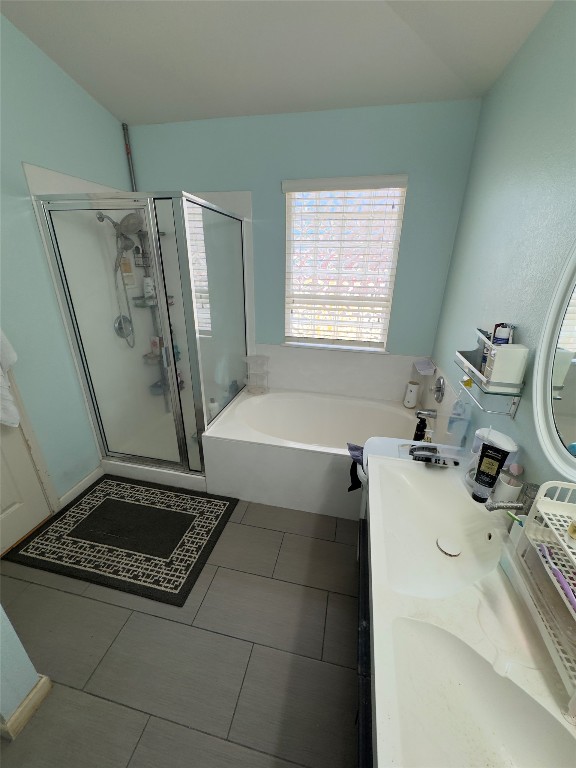 15200 Mandarin Crossing Pflugerville, TX 78660 - Photo 8 of 17 a bathroom with a granite countertop sink a toilet and a shower