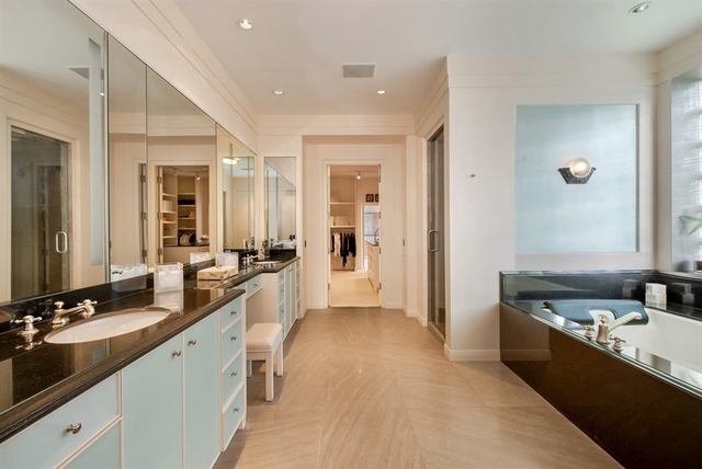 1939 North Howe Street Chicago, IL 60614 - Photo 28 of 54 a large white kitchen with a large window and stainless steel appliances