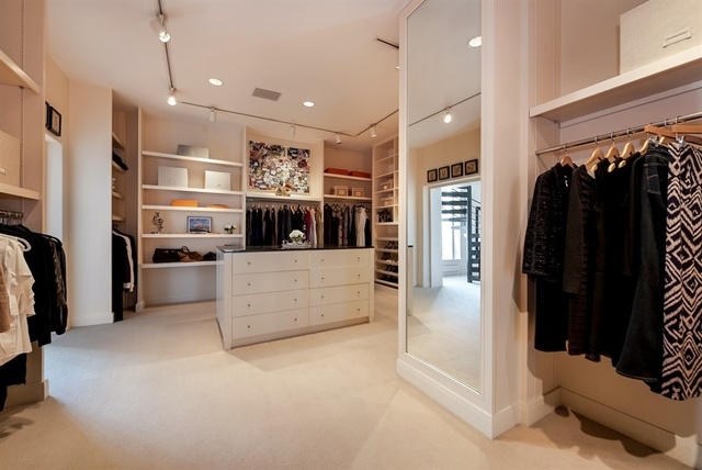 1939 North Howe Street Chicago, IL 60614 - Photo 29 of 54 a kitchen with stainless steel appliances kitchen island granite countertop a refrigerator and a sink