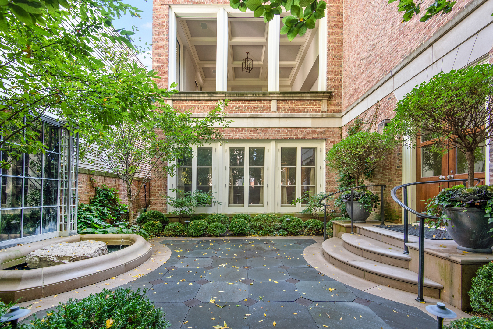 1939 North Howe Street Chicago, IL 60614 - Photo 4 of 54 a front view of a house with a yard