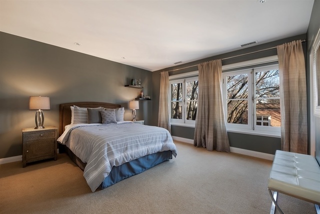 1939 North Howe Street Chicago, IL 60614 - Photo 31 of 54 a bedroom with a large bed and a window