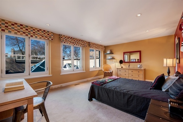 1939 North Howe Street Chicago, IL 60614 - Photo 35 of 54 a bedroom with a bed and dresser