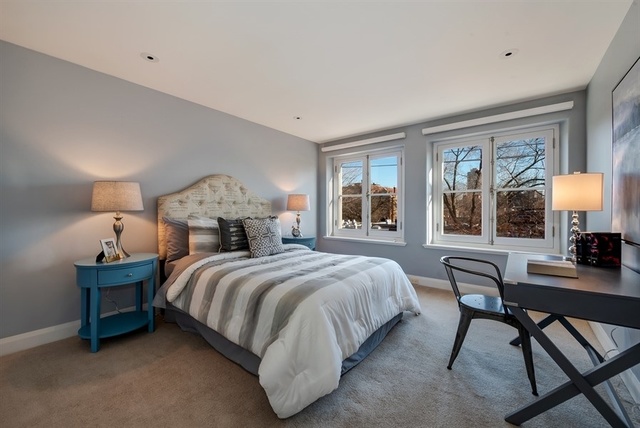 1939 North Howe Street Chicago, IL 60614 - Photo 36 of 54 a bed room with a bed and a table