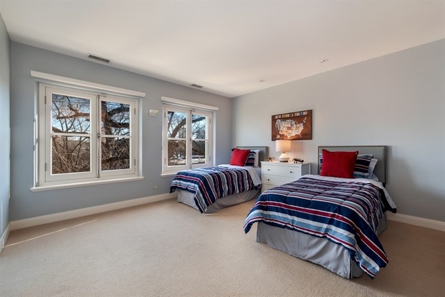 1939 North Howe Street Chicago, IL 60614 - Photo 39 of 54 a bedroom with two beds and a window