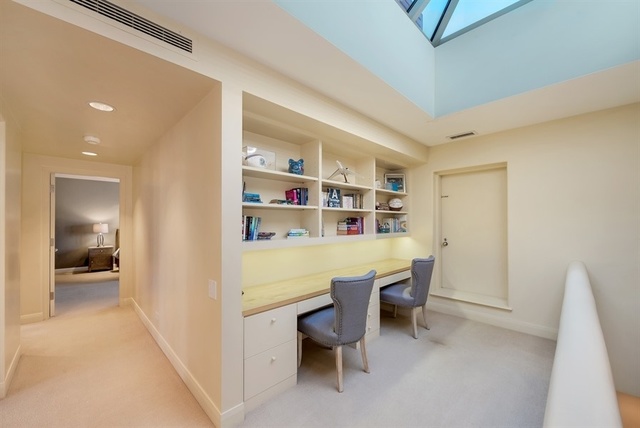 1939 North Howe Street Chicago, IL 60614 - Photo 40 of 54 a room with a chair and white walls