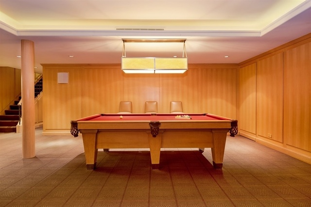 1939 North Howe Street Chicago, IL 60614 - Photo 42 of 54 a room with table chair and a refrigerator