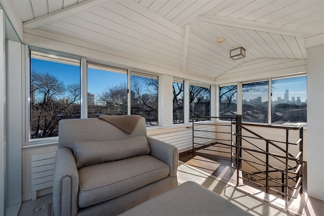 1939 North Howe Street Chicago, IL 60614 - Photo 50 of 54 a living room with furniture and a large window