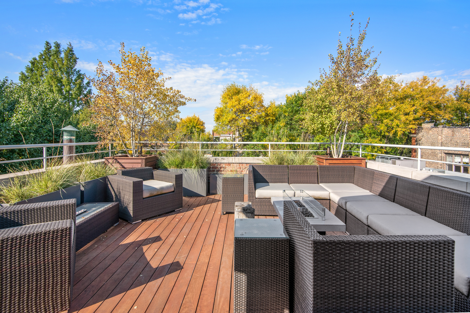 1939 North Howe Street Chicago, IL 60614 - Photo 52 of 54 an outdoor sitting area with furniture and wooden floor