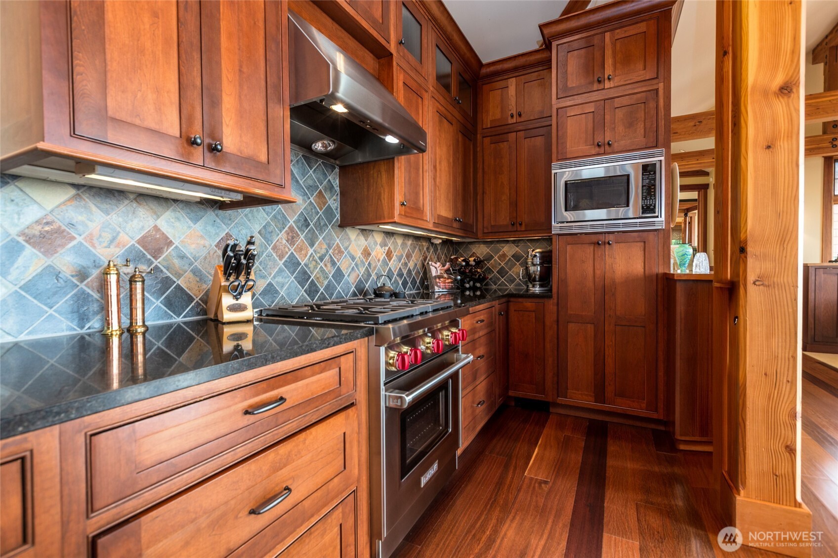 260 West Side Road Friday Harbor, WA 98250 - Photo 12 of 40 a kitchen with stainless steel appliances granite countertop a stove and a microwave