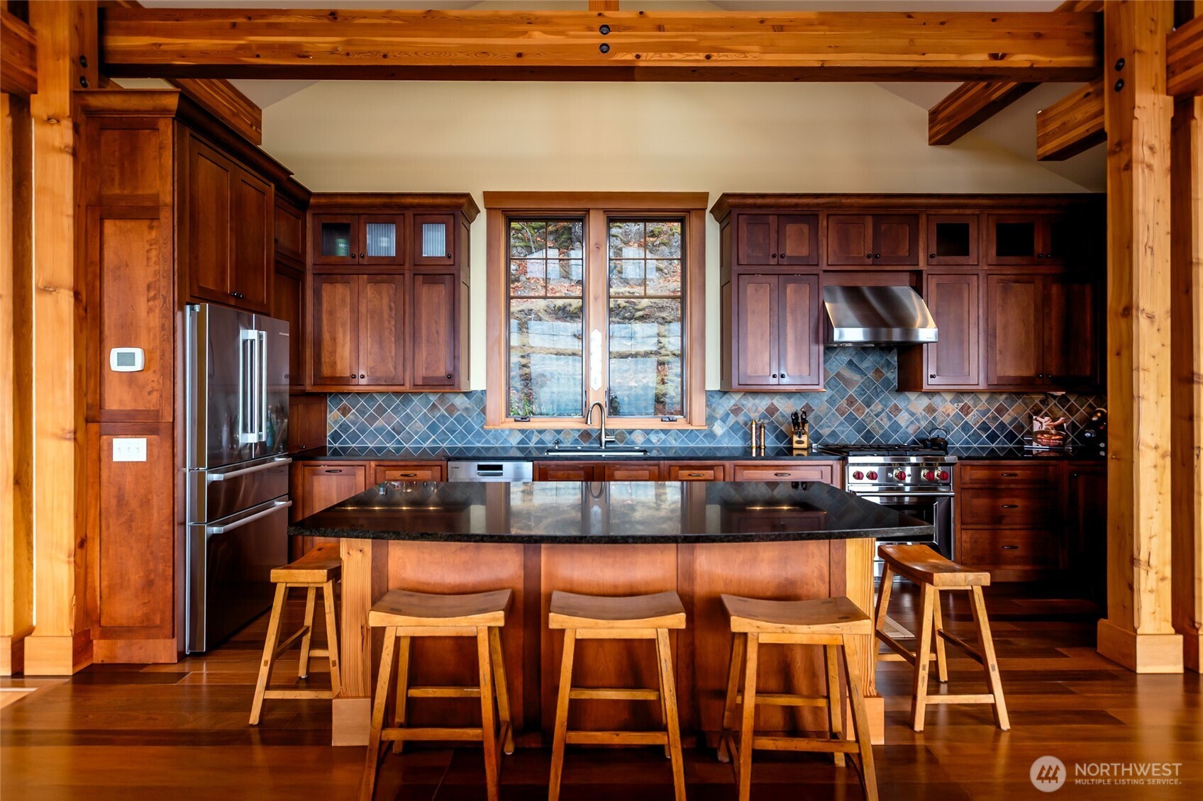 260 West Side Road Friday Harbor, WA 98250 - Photo 13 of 40 a kitchen with a table and chairs in it
