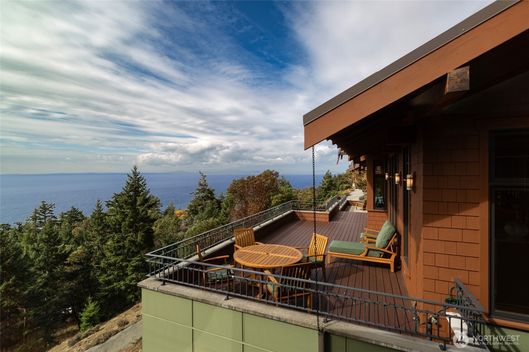 260 West Side Road Friday Harbor, WA 98250 - Photo 21 of 40 a view of a balcony with chairs and a potted plant