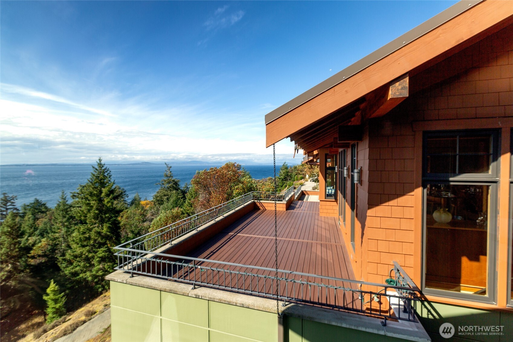 260 West Side Road Friday Harbor, WA 98250 - Photo 3 of 40 a view of a balcony with chairs and a potted plant