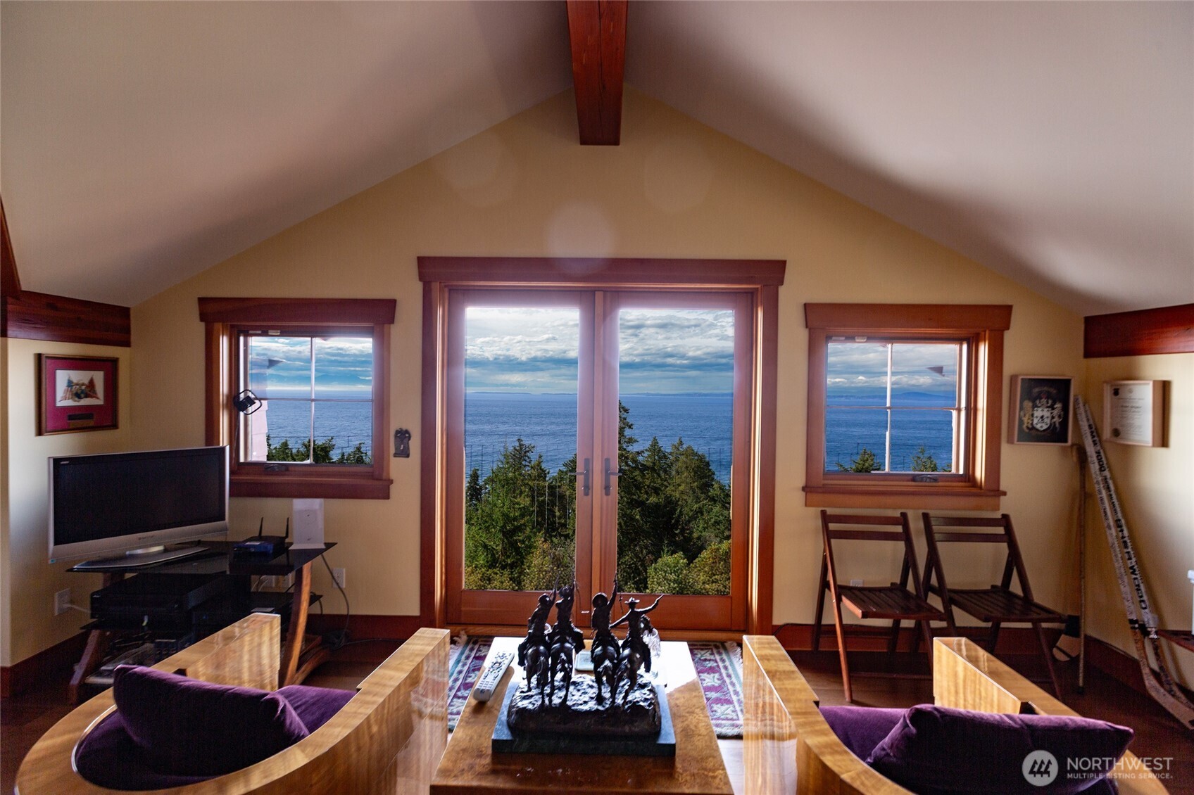 260 West Side Road Friday Harbor, WA 98250 - Photo 33 of 40 a living room with furniture and a flat screen tv