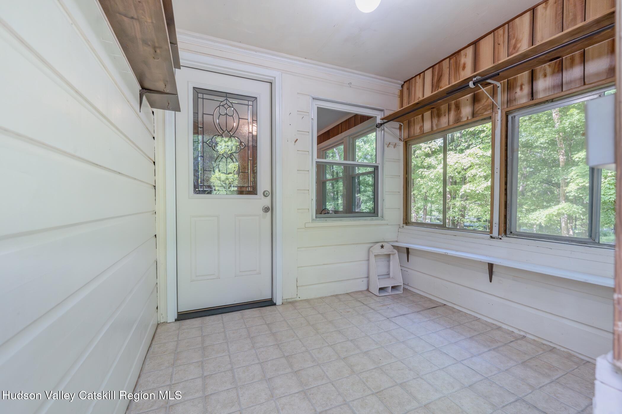 4533 Atwood Road Stone Ridge, NY 12484 - Photo 26 of 63 a view of room with window and furniture