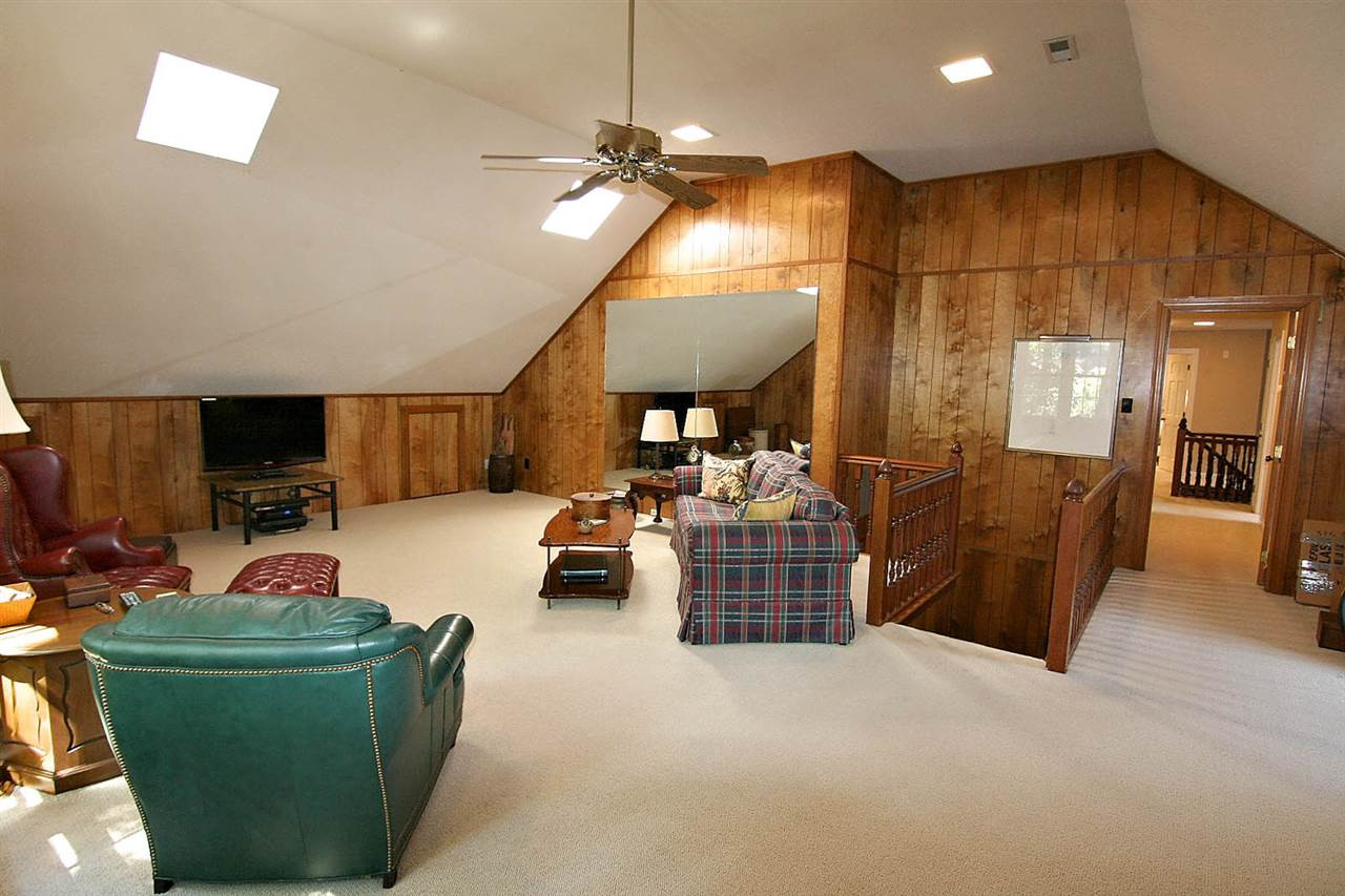 8005 Shellnut Road Raleigh, NC 27615 - Photo 22 of 25 Savor the Essence of the BEST Room for Playing -- Bonus Room has 2nd Floor Hall Access + Bonus Stairs from the 1st Floor. Bonus Room