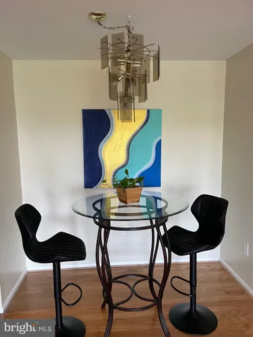 a view of entryway and hall with furniture