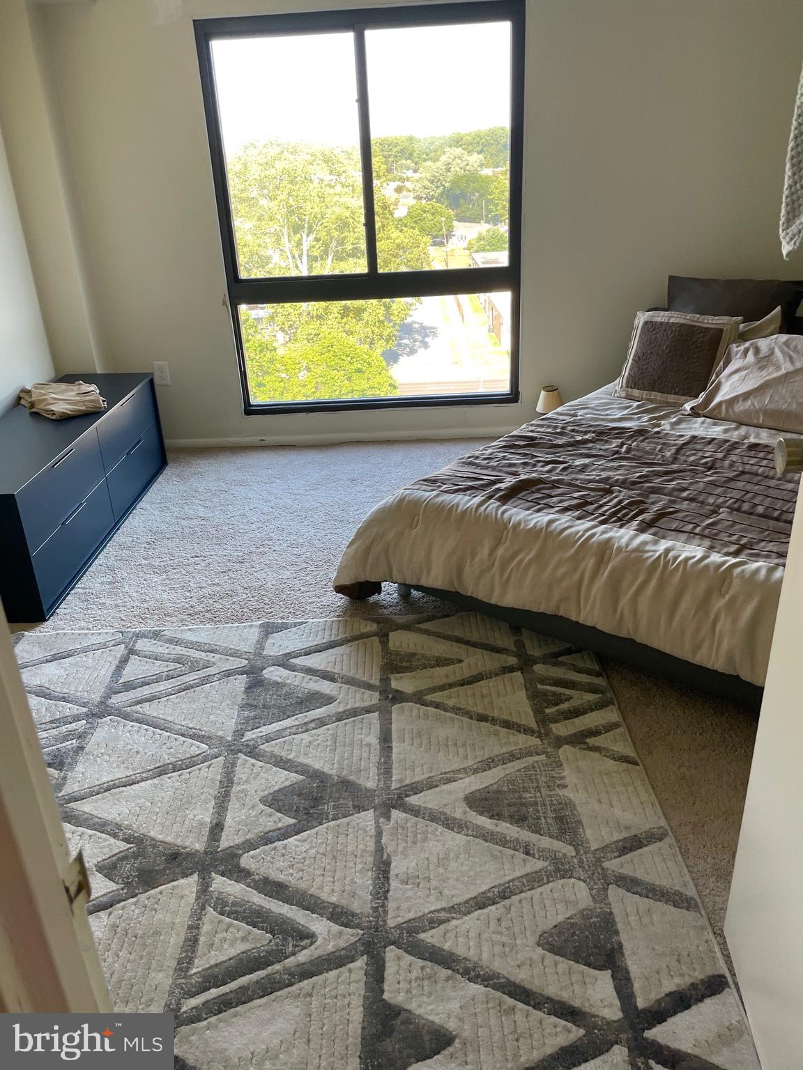 7600 Roosevelt Boulevard, Unit 806 Philadelphia, PA 19152 - Photo 12 of 16 a bedroom with a bed and window