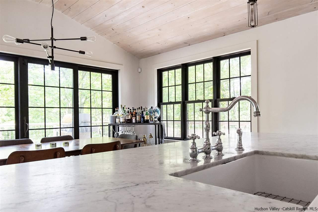 128 Bakertown Road Accord, NY 12404 - Photo 13 of 23 a large white kitchen with a large window