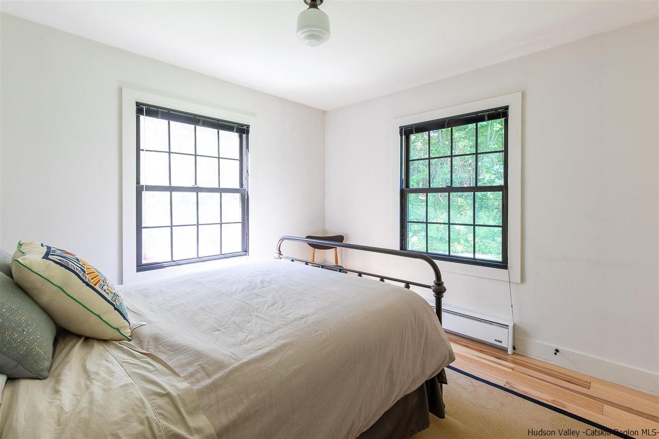 128 Bakertown Road Accord, NY 12404 - Photo 19 of 23 a bedroom with a bed and a window