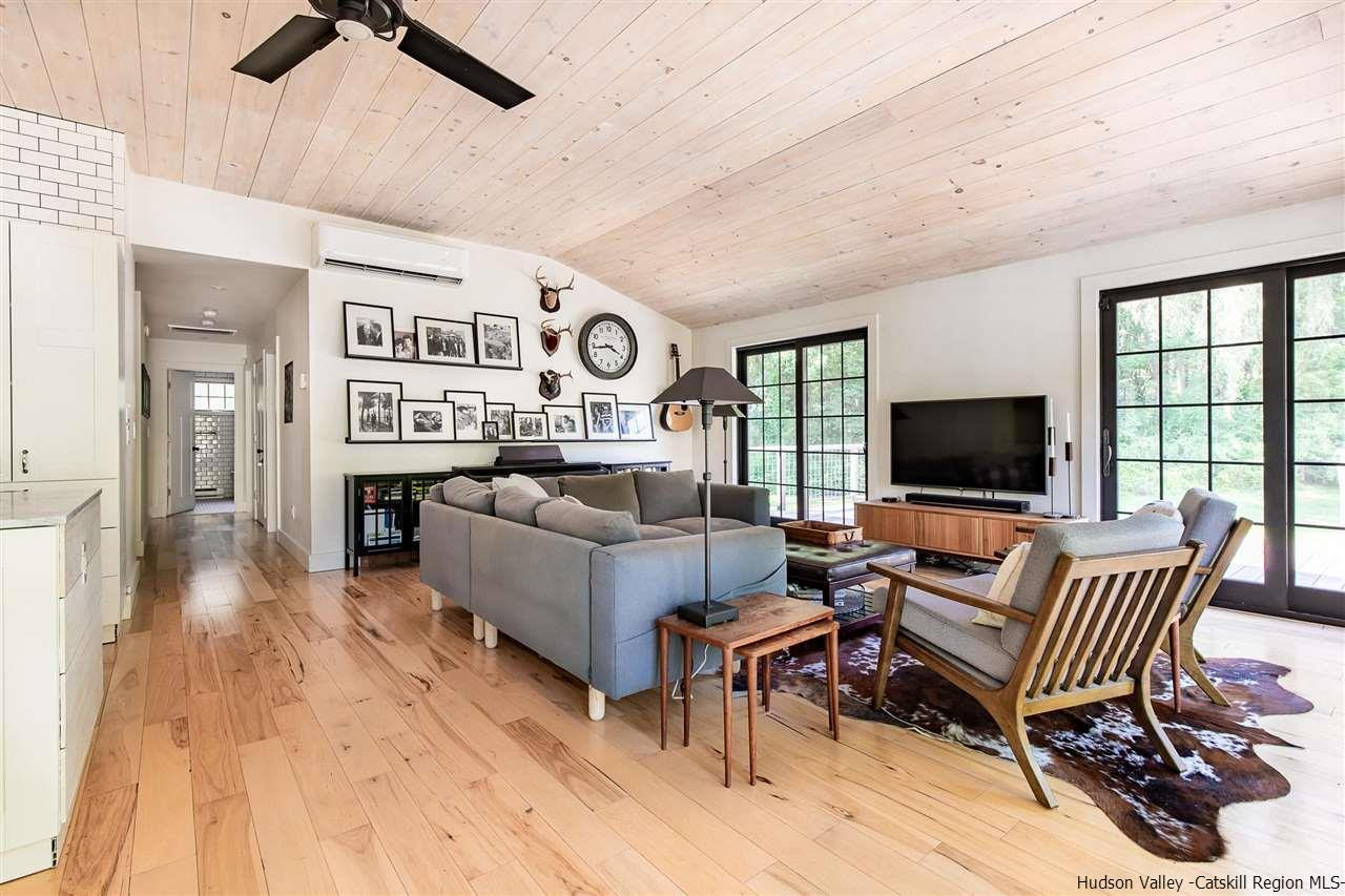 128 Bakertown Road Accord, NY 12404 - Photo 10 of 23 a living room with furniture and a flat screen tv