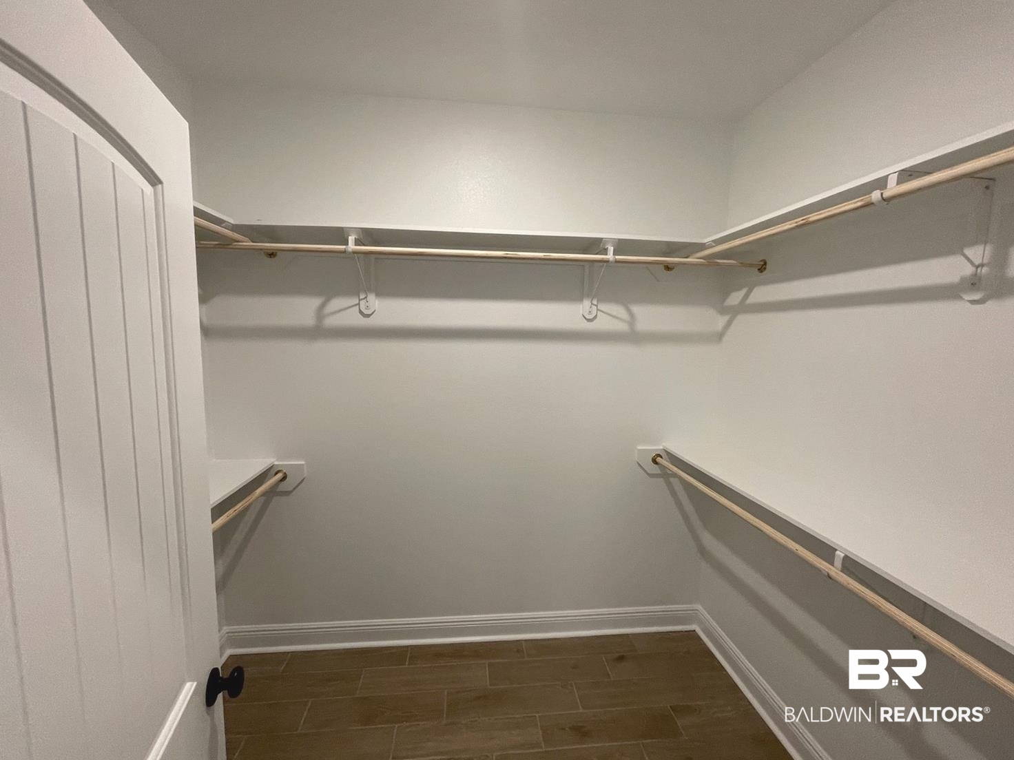 1626 Fenton Circle Foley, AL 36535 - Photo 9 of 16 Spacious closet with dark hardwood / wood-style flooring