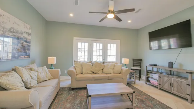 a living room with furniture and a window