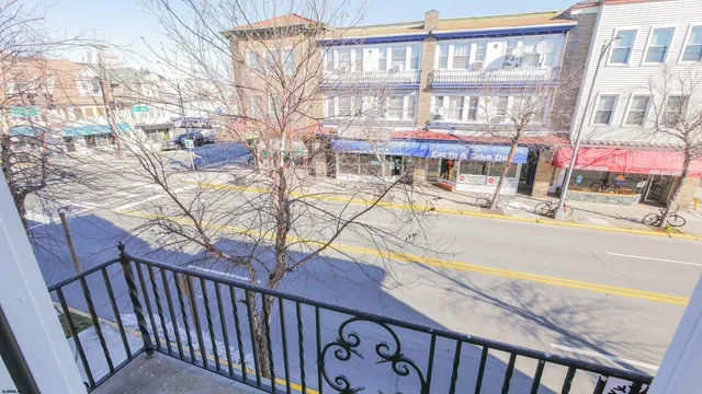 a view of a building with sitting area