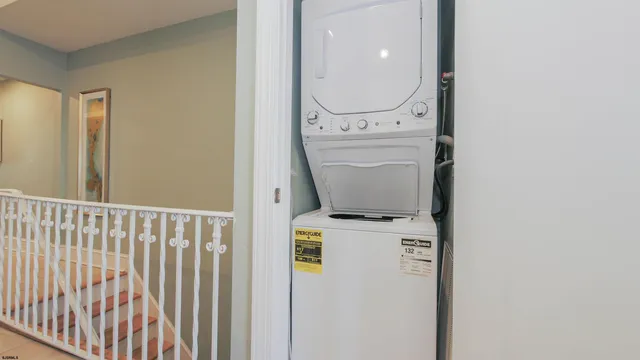 a bathroom with a sink mirror toilet and bathtub