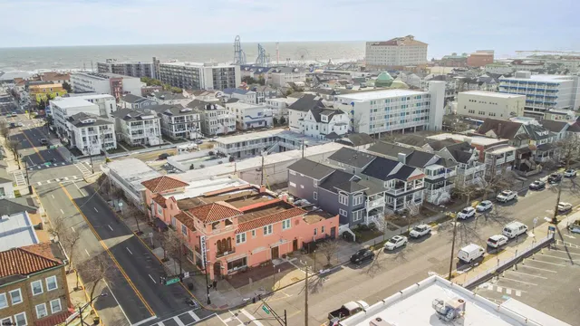 an aerial view of a building with city view
