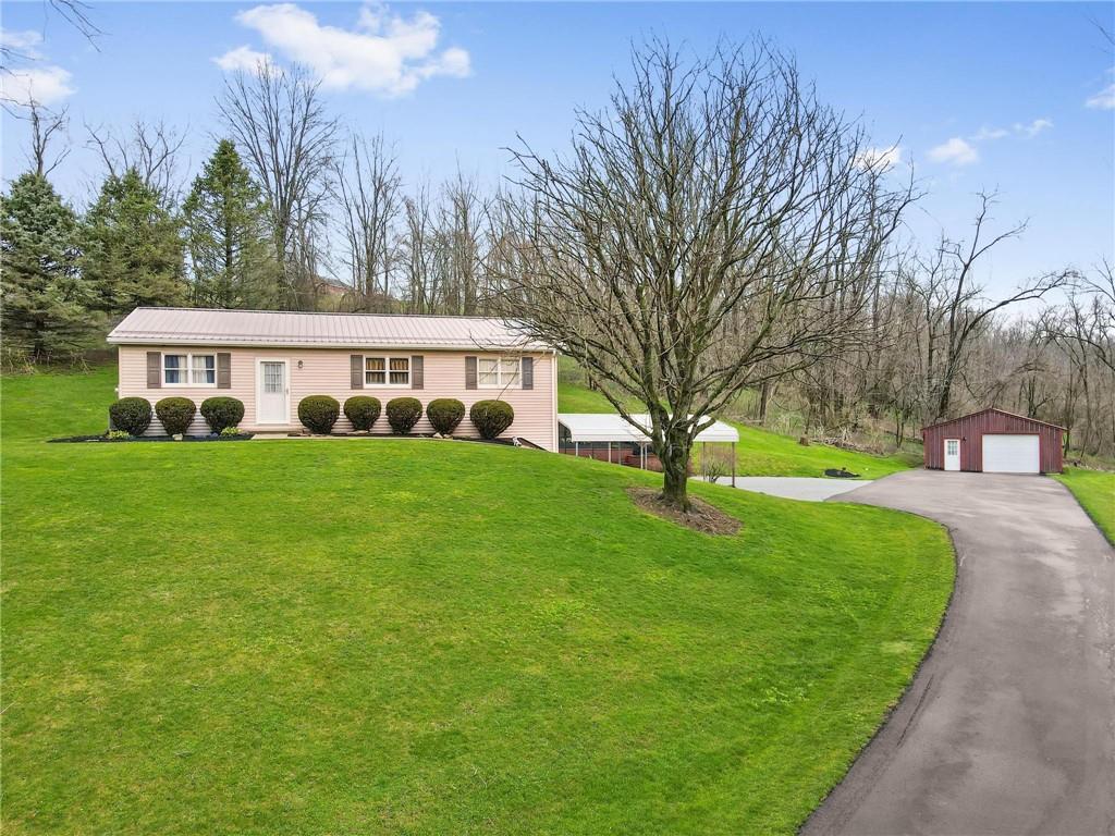 205 Ross Road Eighty Four, PA 15330 - Photo 1 of 25 a house view with a garden space