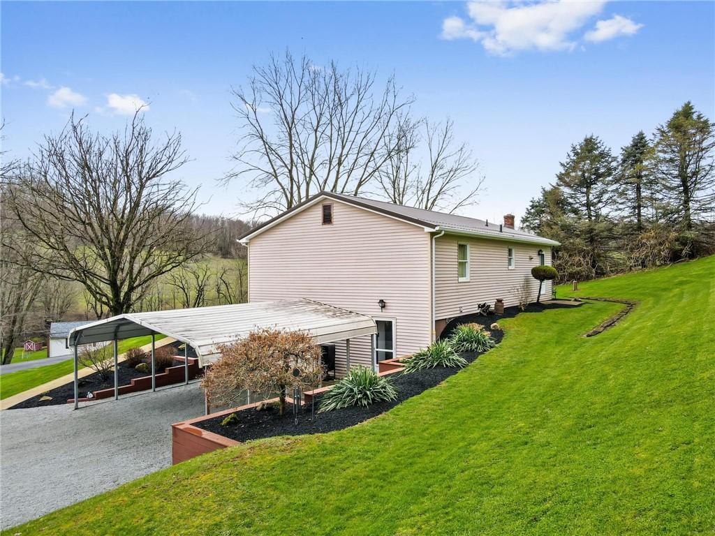 205 Ross Road Eighty Four, PA 15330 - Photo 23 of 25 a view of a house with backyard