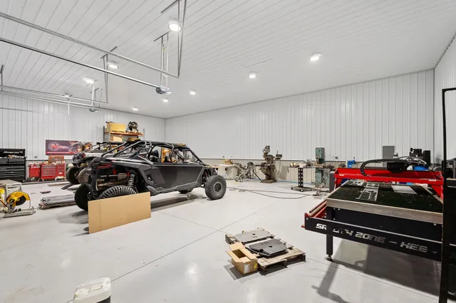 a car parking garage with lots of chairs and toys