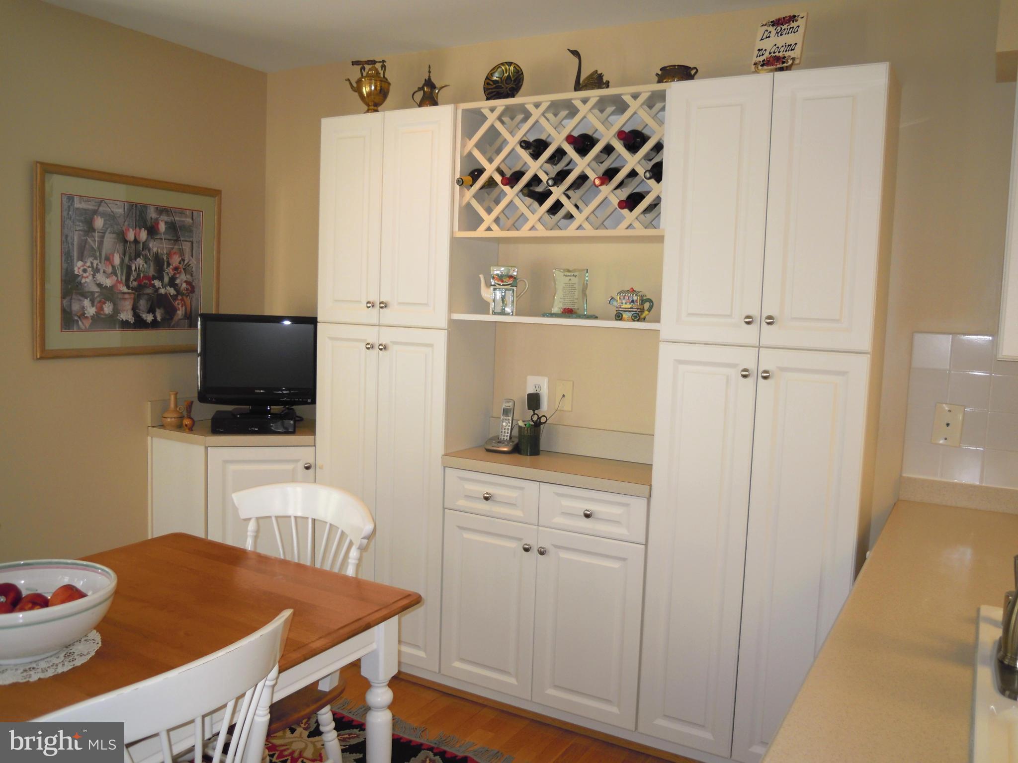 12300 Rosslare Ridge Road, Unit 401 Lutherville-Timonium, MD 21093 - Photo 10 of 30 Custom Built-in: Entertainment, storage, display