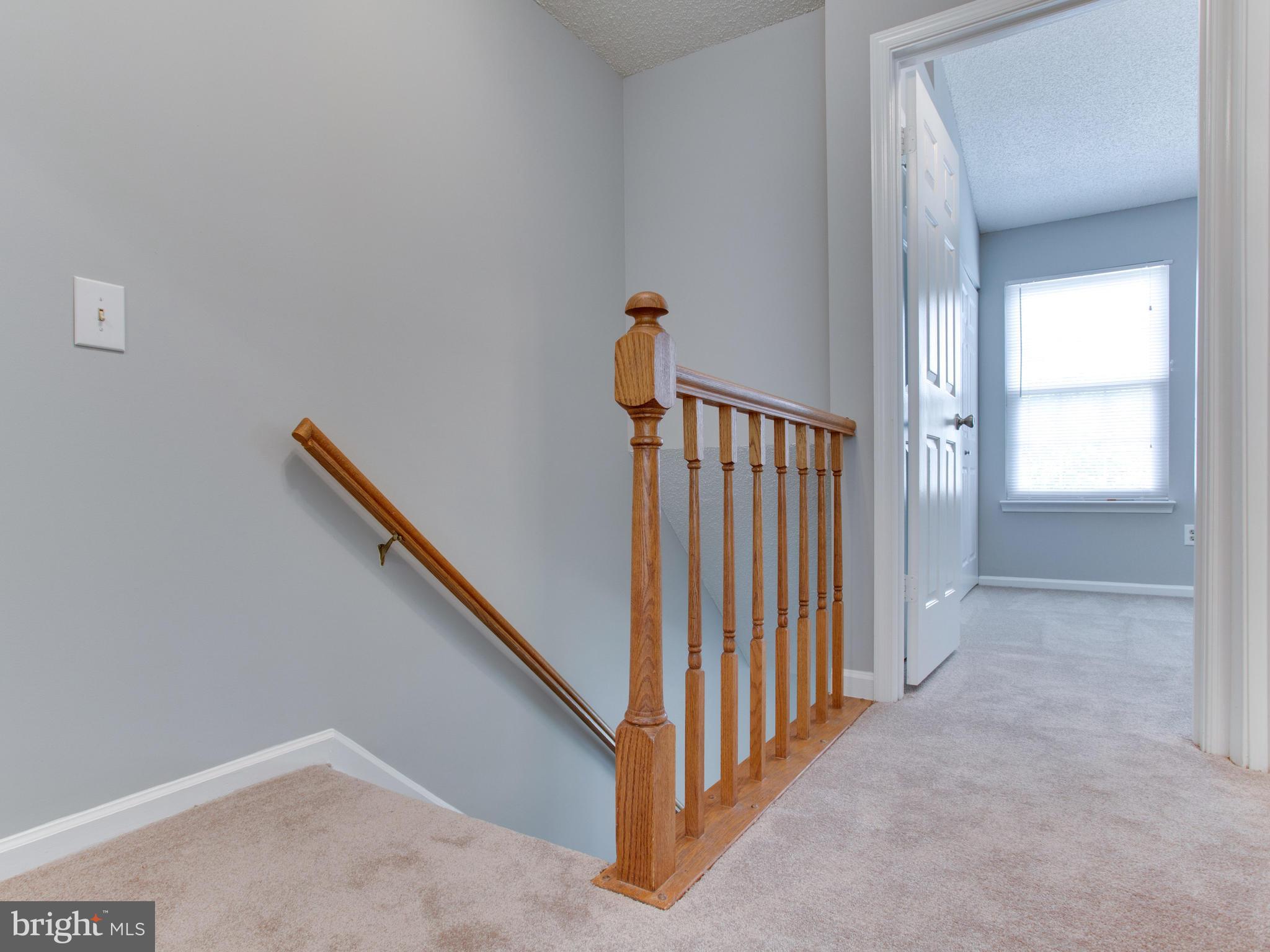14775 Basingstoke Loop Centreville, VA 20120 - Photo 12 of 21 a view of a hallway with window