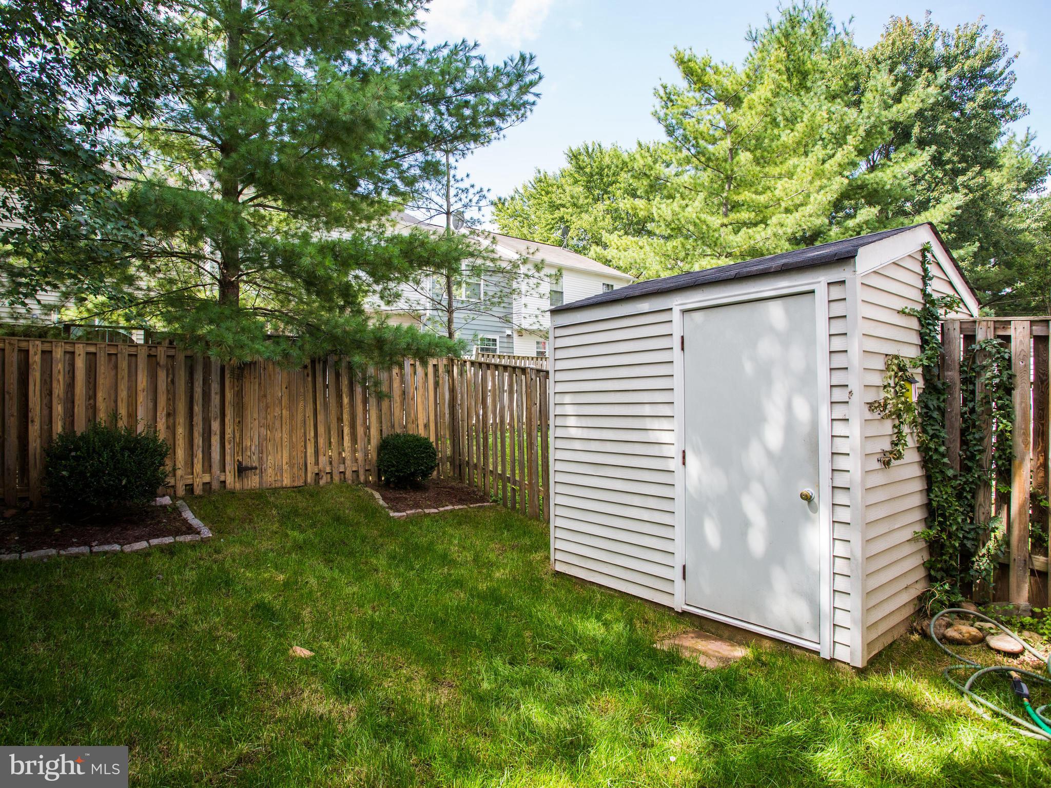 14775 Basingstoke Loop Centreville, VA 20120 - Photo 19 of 21 a view of backyard with green space