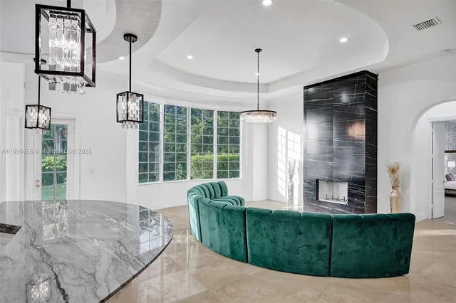 a living room with furniture and a window